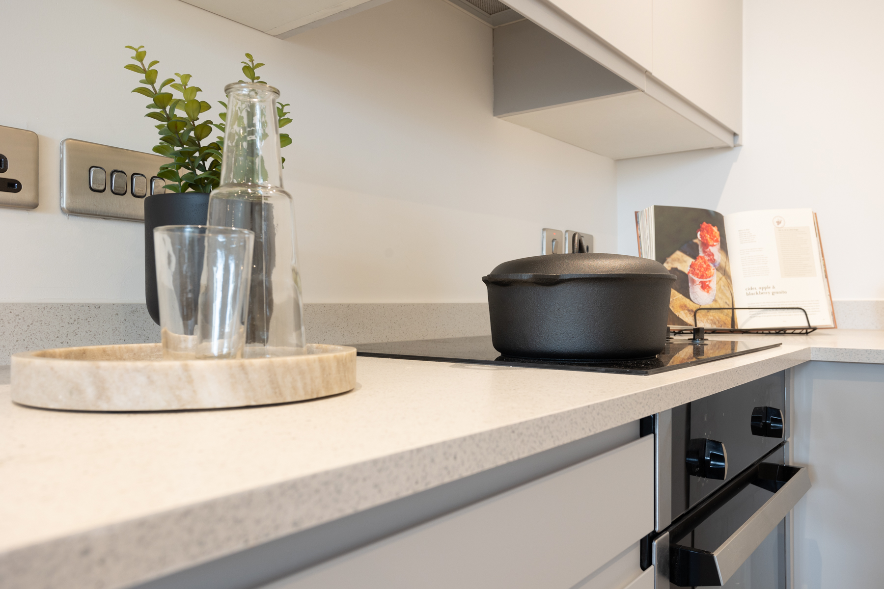 Close up view of kitchen unit and oven.