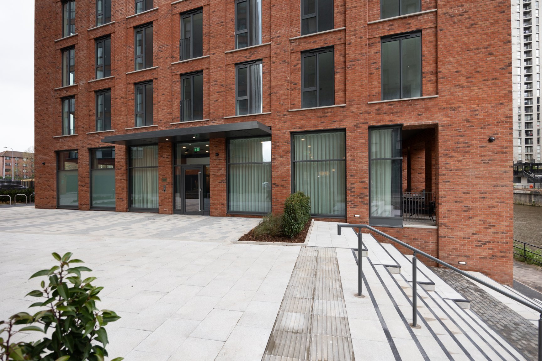Silkbank Wharf Entrance with steps to the right leading down to the River Irwell