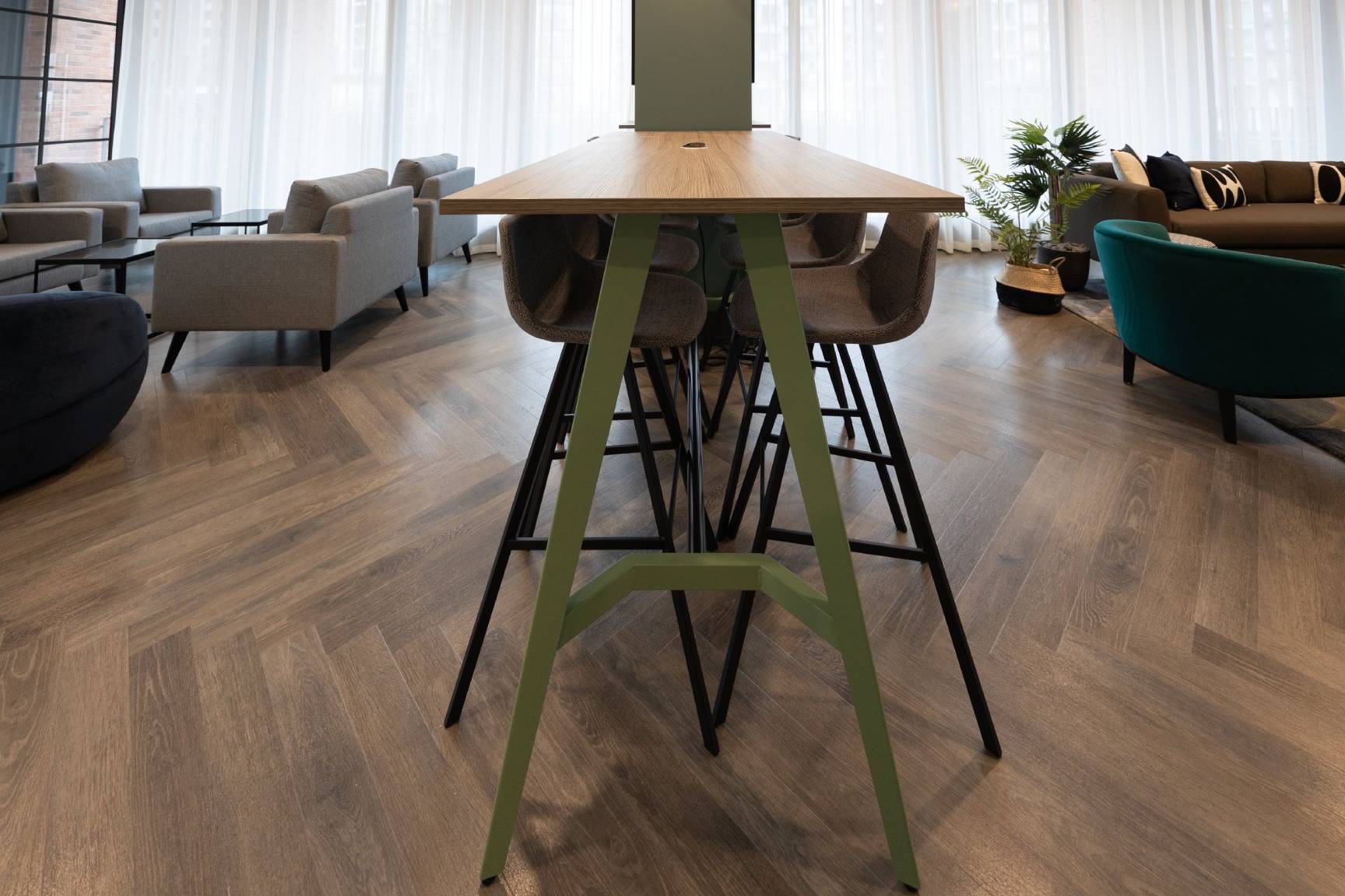 Close up view of high tables and chairs for working.