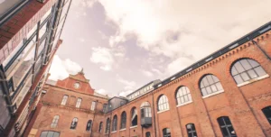 Courtyard view looking up at Queens Brewery in Manchester