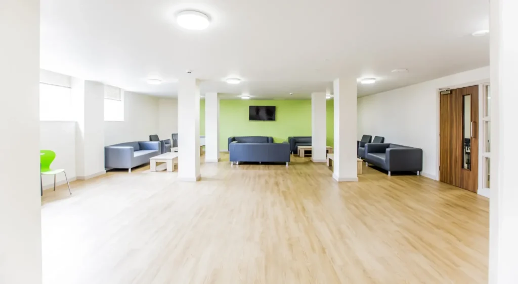 Large open communal area with sofas